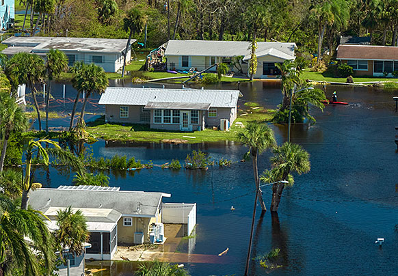 Homes surrounded by flood water